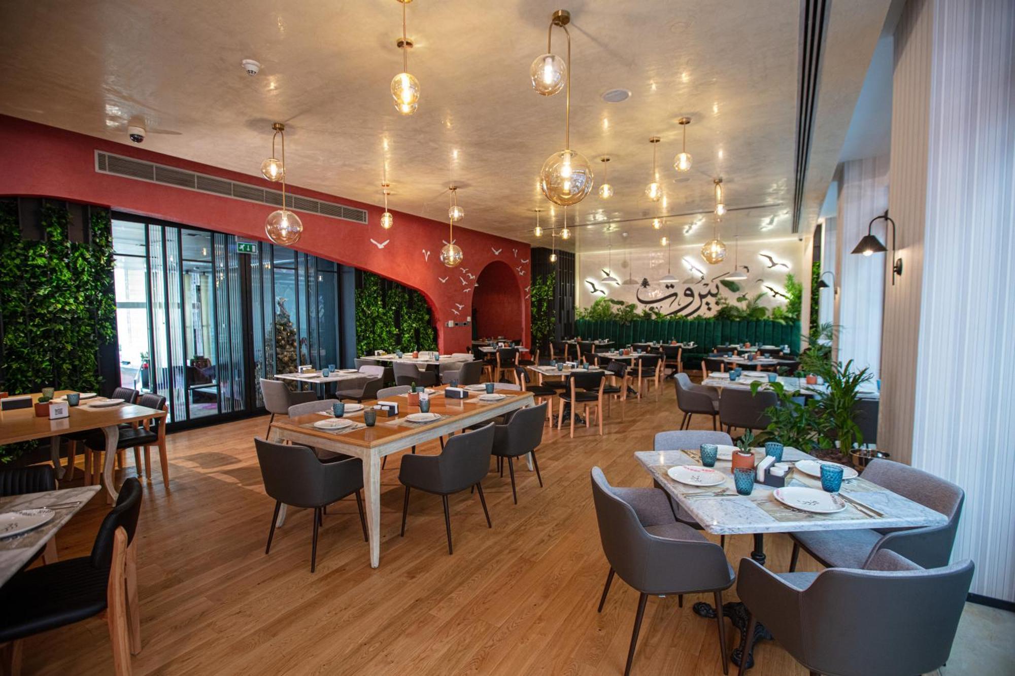 עמאן The Abdali Boulevard Hotel מראה חיצוני תמונה The restaurant's interior