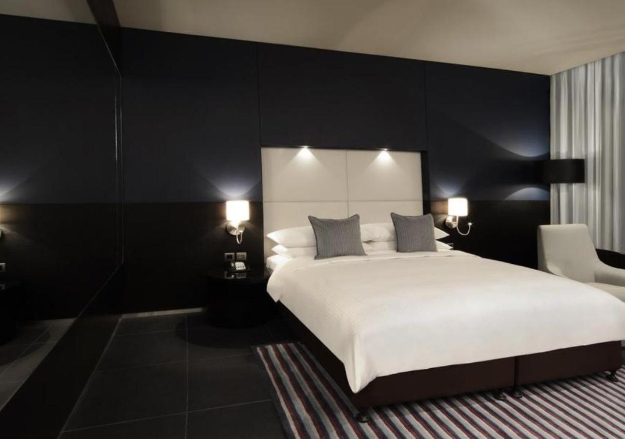 עמאן The Abdali Boulevard Hotel מראה חיצוני תמונה A bedroom at the hotel