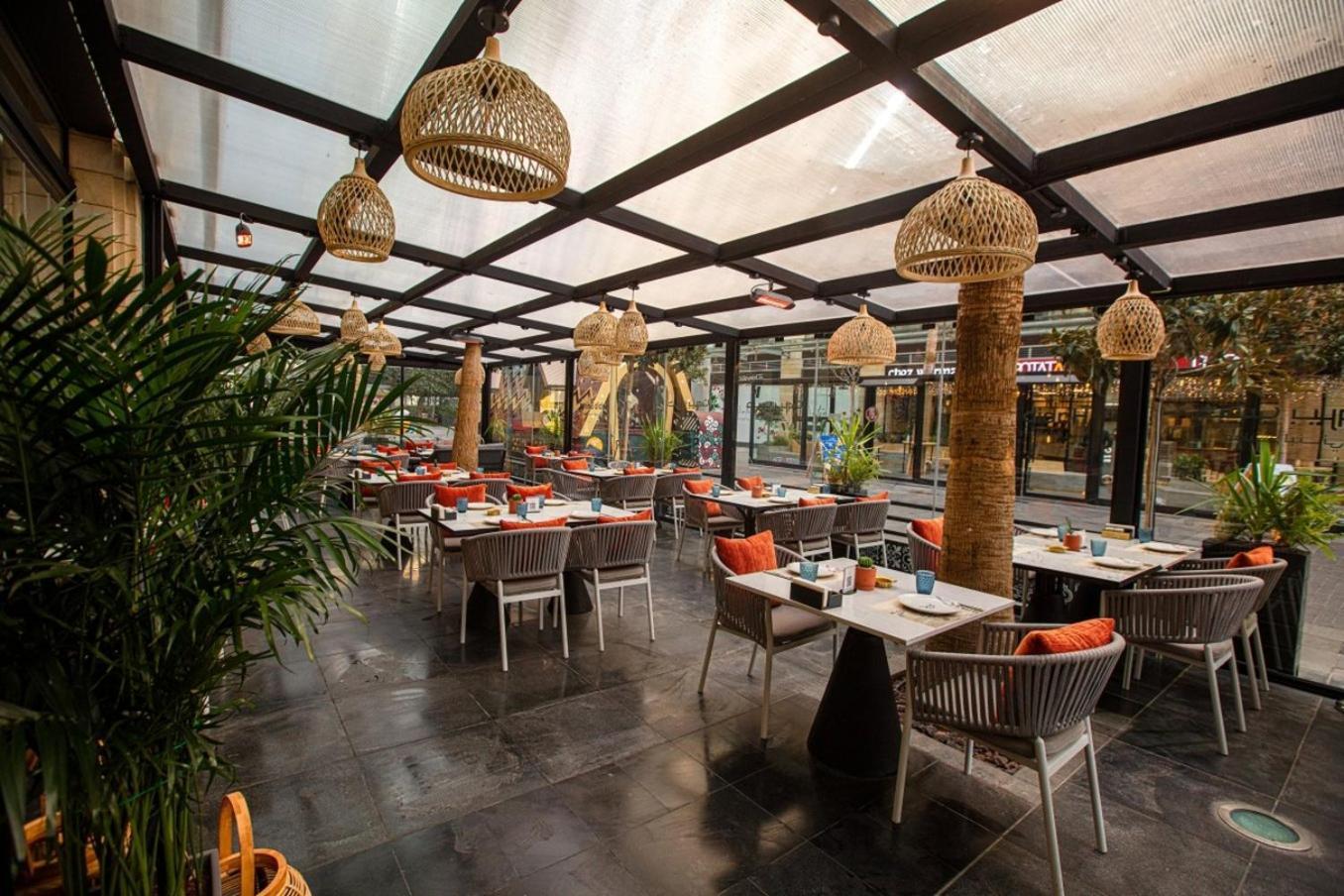 עמאן The Abdali Boulevard Hotel מראה חיצוני תמונה The interior of the restaurant